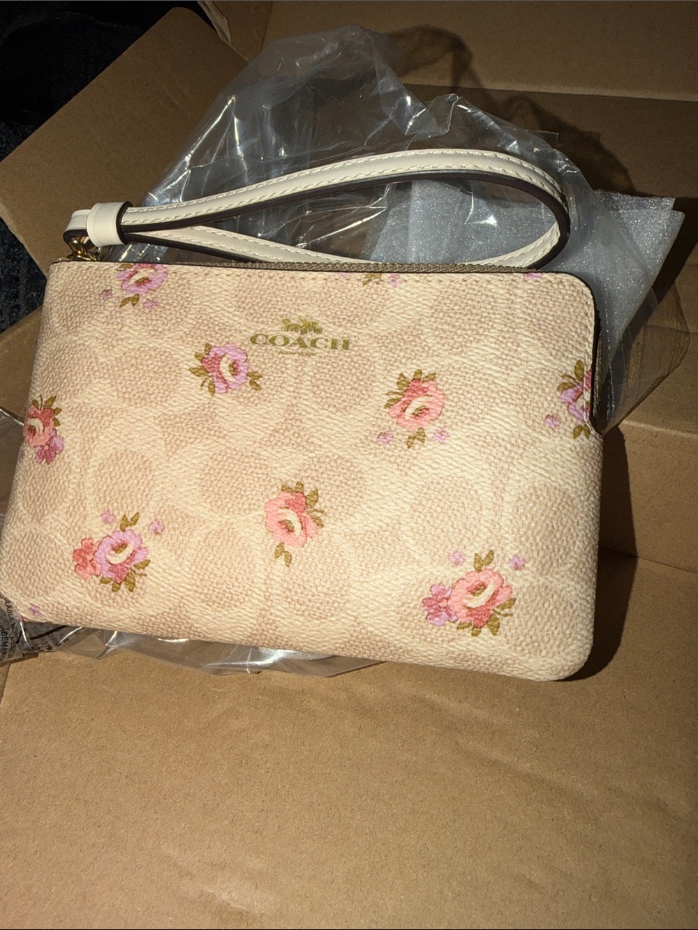 Coach Pink Floral Signature Canvas Wristlet with Cream Strap